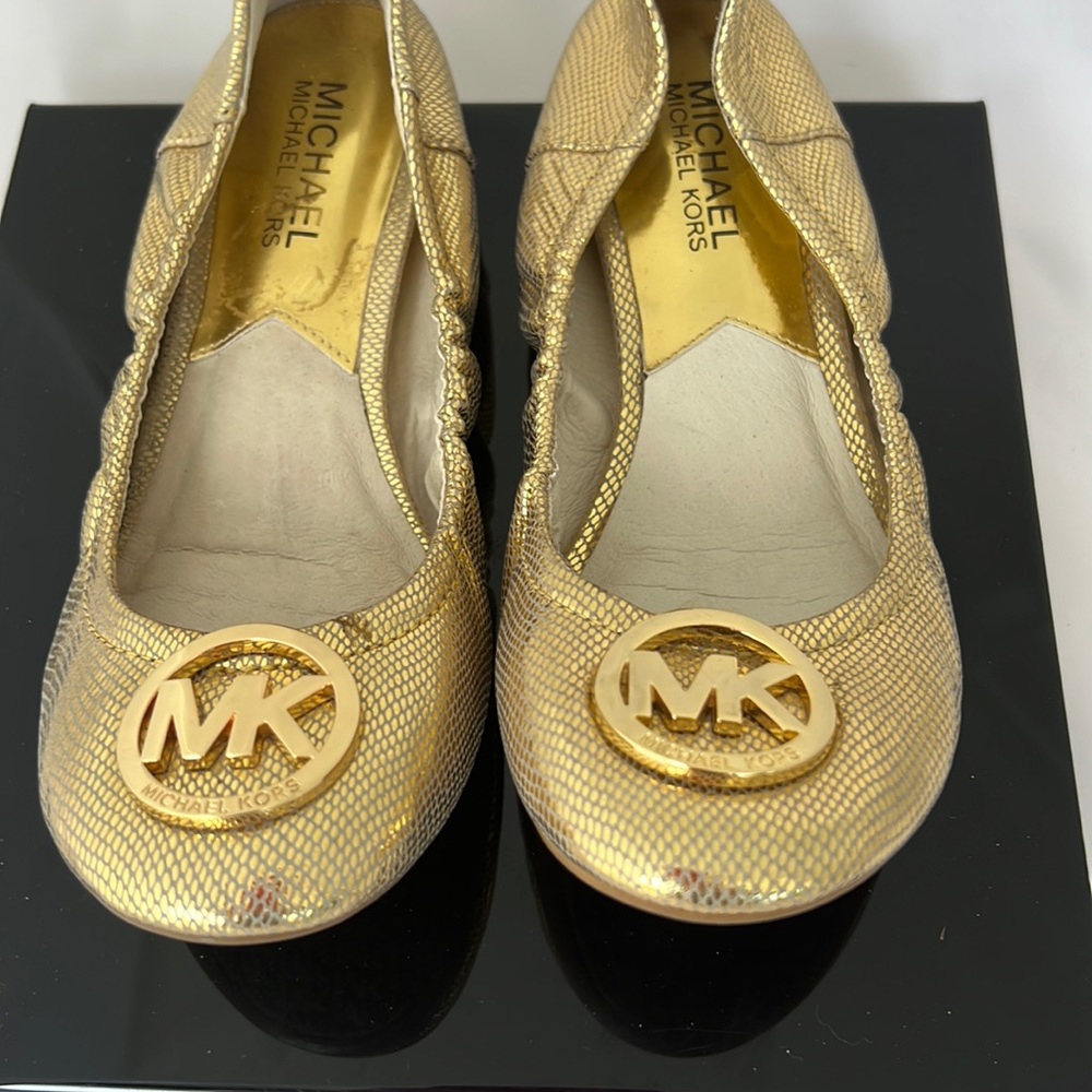 Michael Kors loafers, size 6, gold.